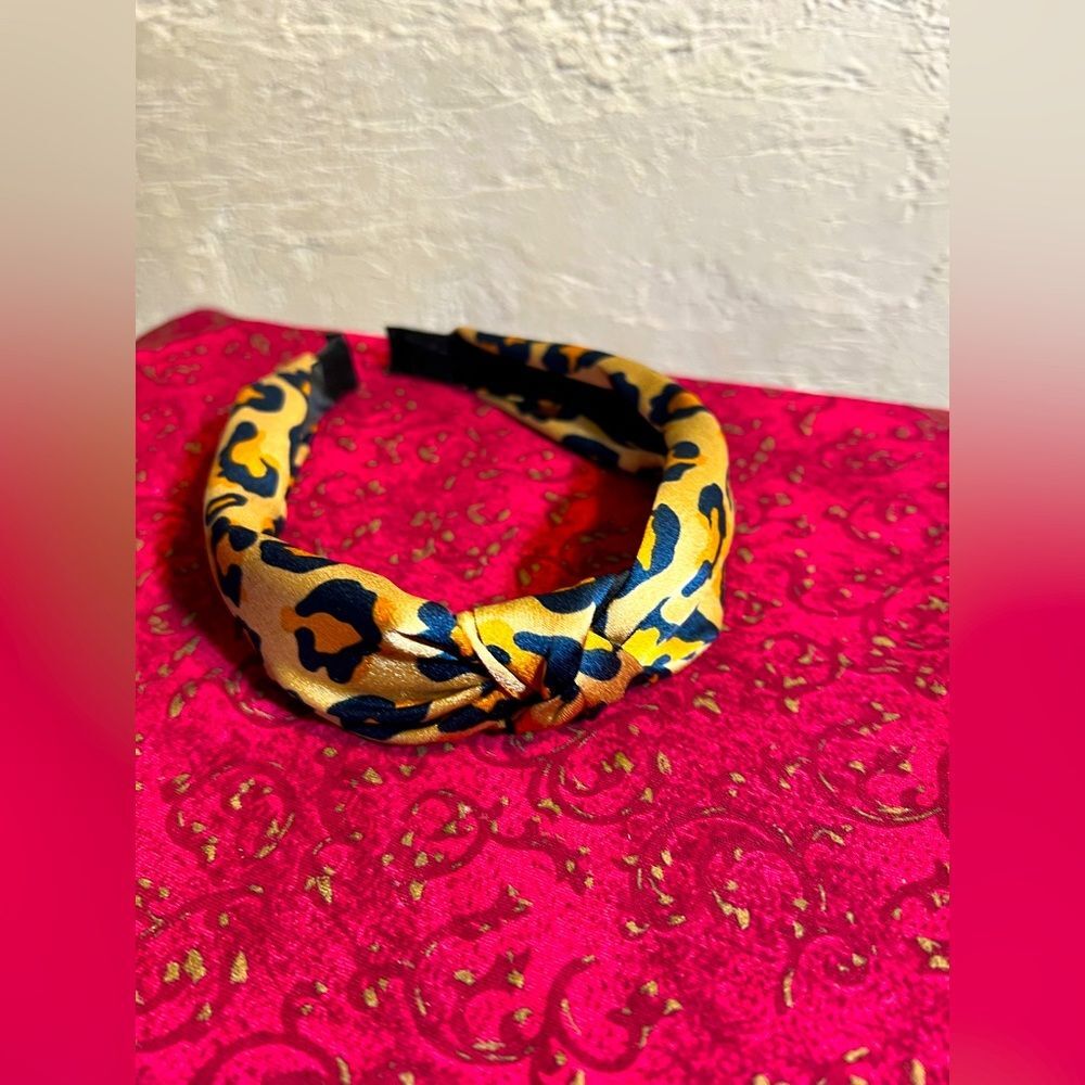 Headband- NEW, beautiful cheetah print with navy, gold and orange,satin, knot